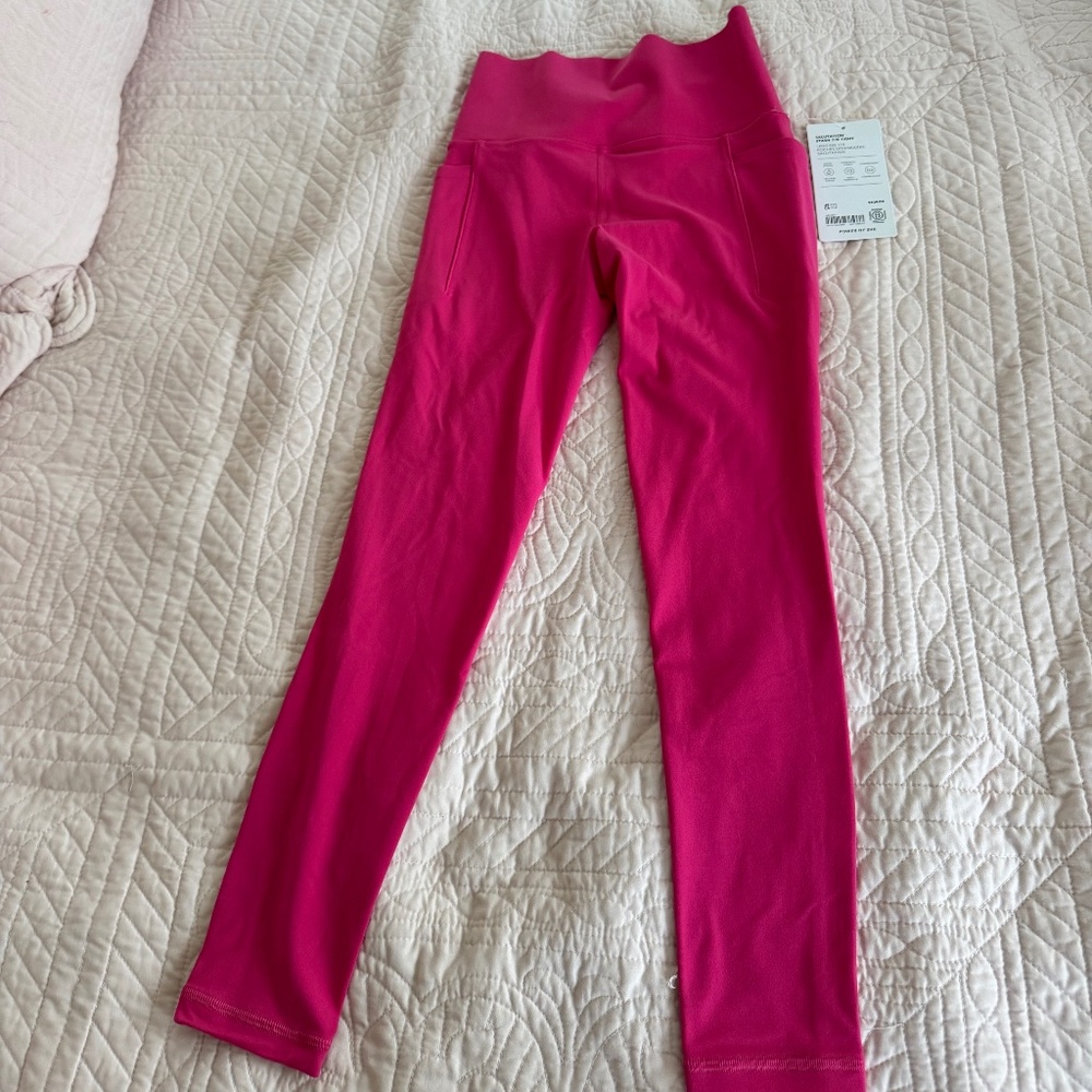 Athleta SALUTATION STASH 7/8 TIGHT